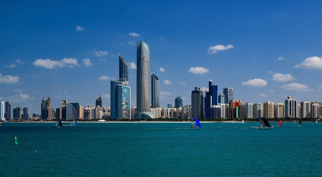 Abu Dhabi skyline across the water, the city where an ice bath at home has to survive 48C summer heat