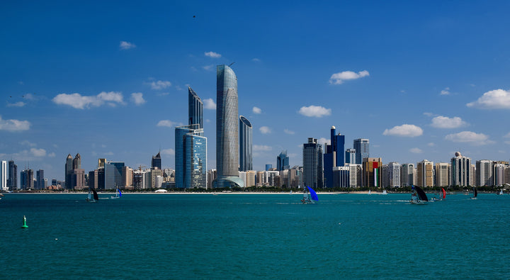 Abu Dhabi skyline across the water, the city where an ice bath at home has to survive 48C summer heat
